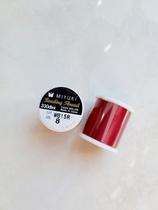 1 bobine de 50m fil nylon MIYUKI couleur Red 8